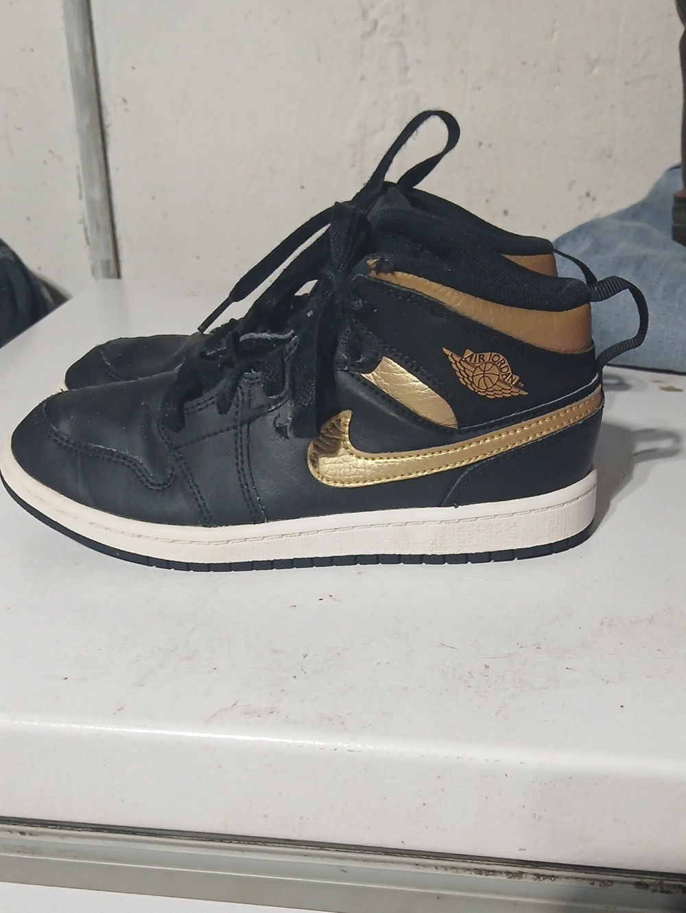 Nike Kids Black and Gold High-Top Sneakers